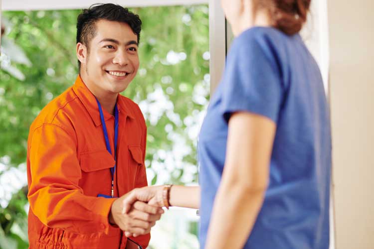 service-worker-shaking-hand-of-customer-2021-08-27-18-28-26-utc