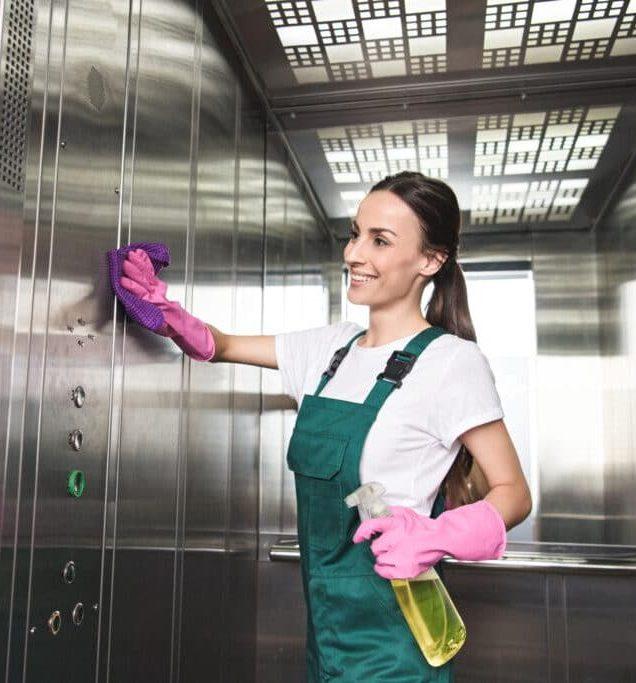 happy worker scrubbing wall
